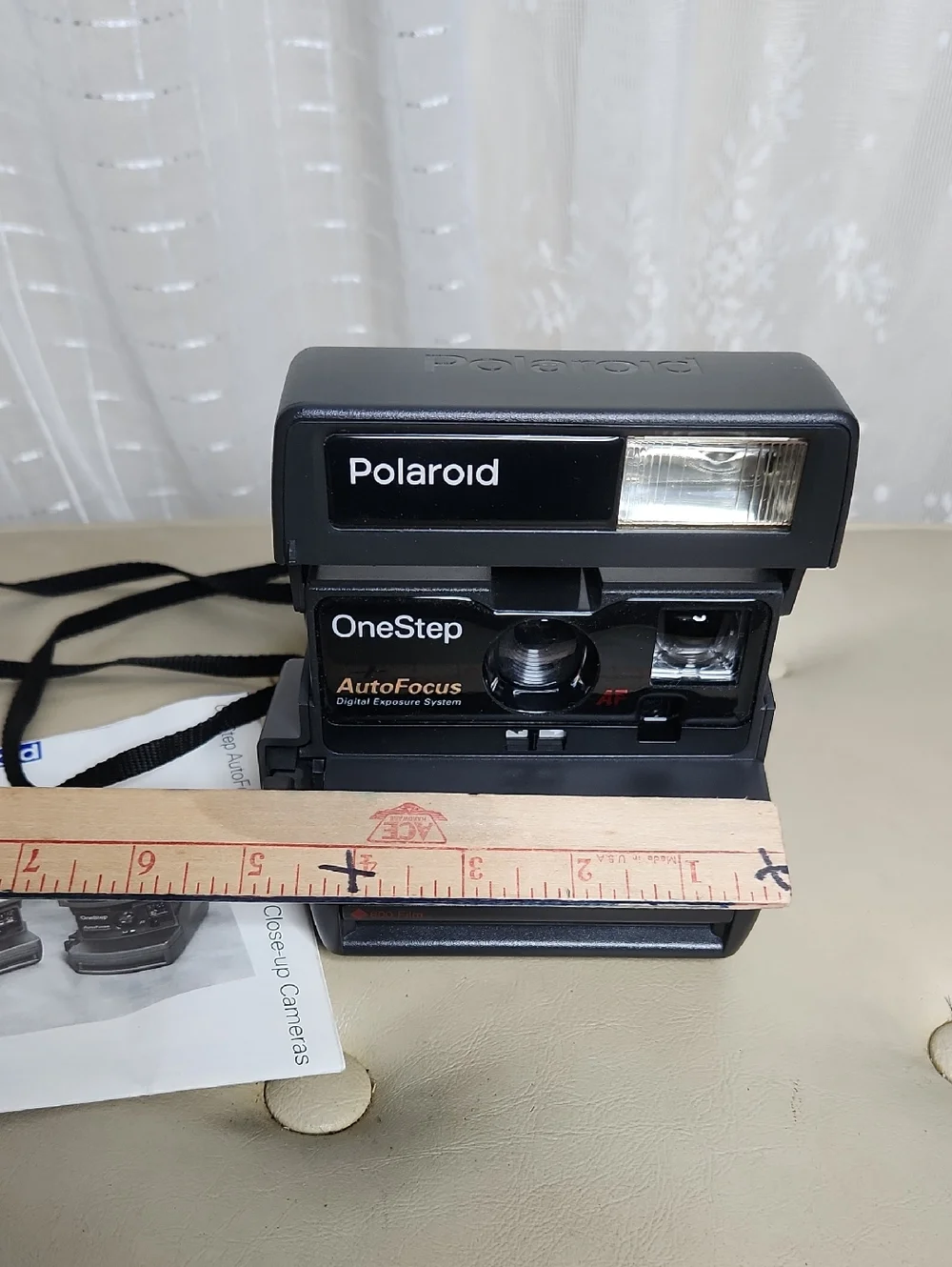 Polaroid OneStep Autofocus 600 instant film camera W/ instruction Manual